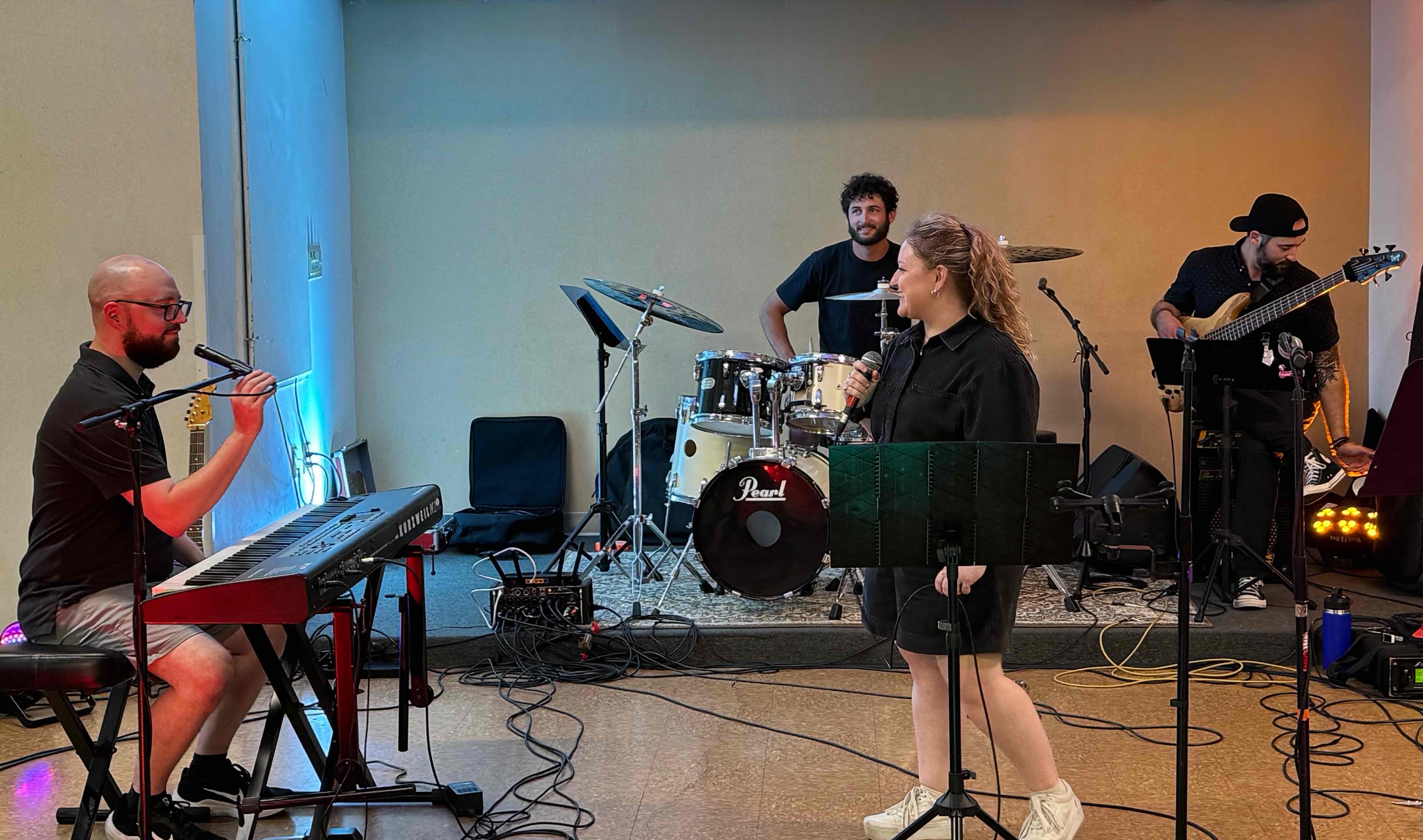 Showcase performance with the band on stage