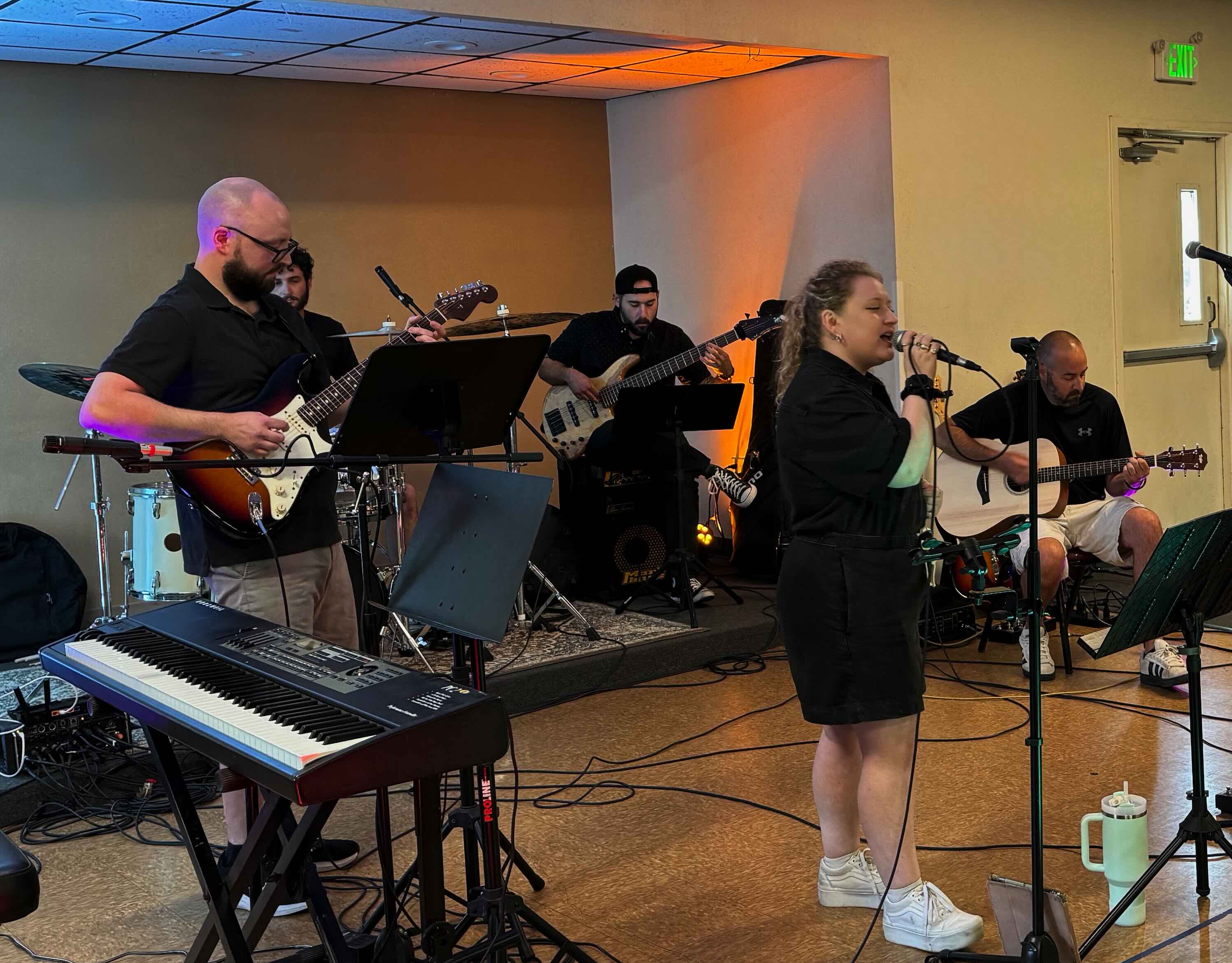 Guitarist playing on stage at the student showcase